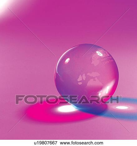 Stock Photo - shadow, map, planet, earth, crystal, still. Fotosearch