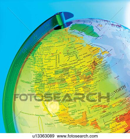 Stock Photo - spherical, continents, countries, representation, sea, globe, axis. Fotosearch