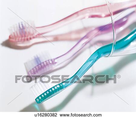 Stock Image - shadow, brushes, background, glass, dental, dentistry, indoor. Fotosearch