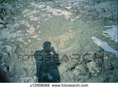 Stock Photo - ground, sun light, shadow. Fotosearch