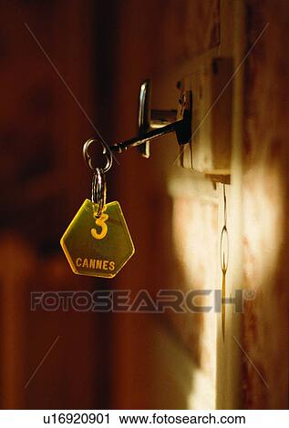 shadow, sun light, key, key chain, door, doorknob View Large Photo Image Stock Image - shadow, sun light, key, key chain, door, doorknob. Fotosearch