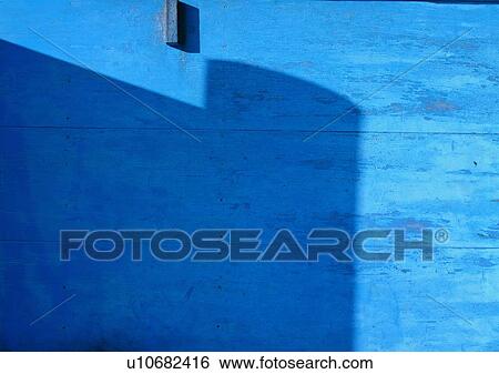 Stock Photograph - wall, blue, shadow, sun light. Fotosearch