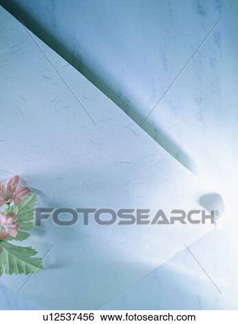 Stock Photograph - indoor, light, paper, material, artificial flower, shadow. Fotosearch