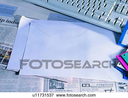 Stock Photo - paper, keyboard, disk, material, indoor, light. Fotosearch