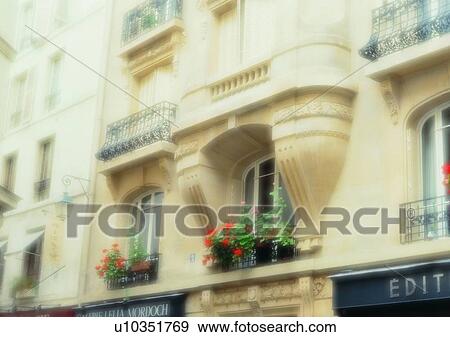 Stock Photo - outdoor, soft focus, Europe, plant, flower, building. Fotosearch