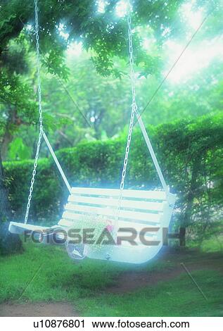 Stock Image - outdoor, soft focus, swing, flower, grass, park. Fotosearch