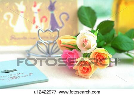 table, rose, plant, leaf, light, flower, glass bottle View Large Photo Image Stock Photo - table, rose, plant, leaf, light, flower, glass bottle. Fotosearch