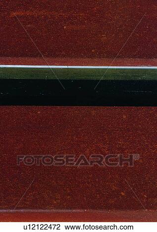 Stock Image - line, material, sun light, wall, shadow, structure. Fotosearch