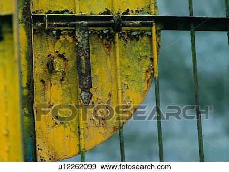 Stock Photo - metal, doorknob, lock, material, pattern, yellow. Fotosearch