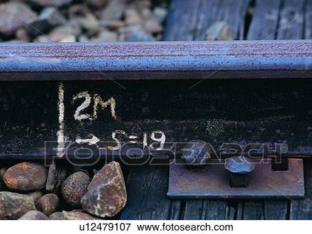 Stock Photo - structure, material, iron, rail, stone. Fotosearch