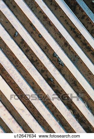 structure, material, iron, roof, wood stick, metal View Large Photo Image Picture - structure, material, iron, roof, wood stick, metal. Fotosearch