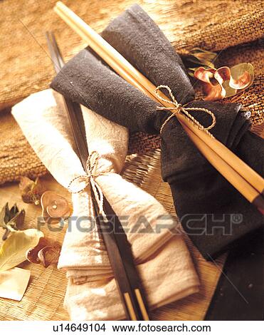 Picture - chopsticks, close up, string, napkin, toned, bow, culture. Fotosearch