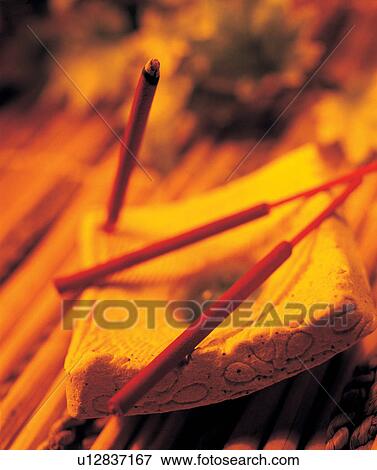 Stock Photo - close up, indoor, incense sticks. Fotosearch