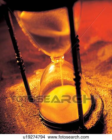Picture - hourglass, time, light, limit. Fotosearch