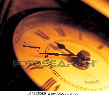 Stock Photo - time piece, shadow, appearance, instrument, timekeeper, hour. Fotosearch