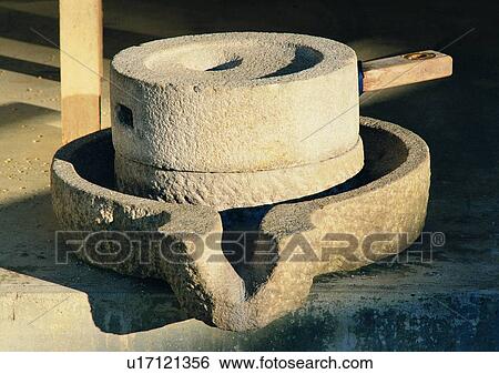 Stock Photograph - outdoor, machine, mortar, stone, village, farm. Fotosearch