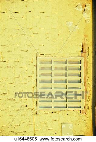 Stock Photography - rock, stone, wall, outdoor, window, yellow. Fotosearch