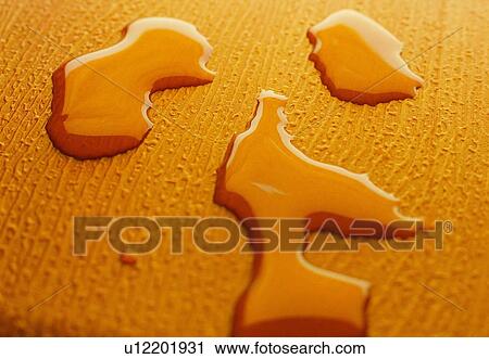 Stock Image - drop, orange, close-up, water. Fotosearch