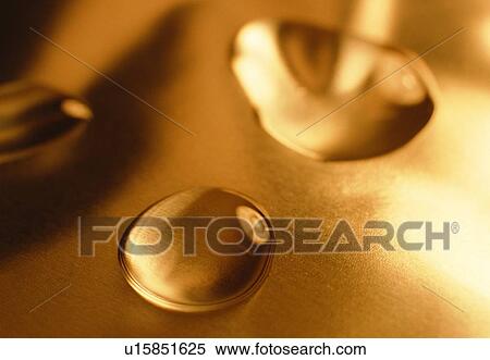 Stock Photography - water, drop, orange, close-up, yellow. Fotosearch