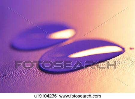 Stock Photograph - water, drop, purple, close-up. Fotosearch