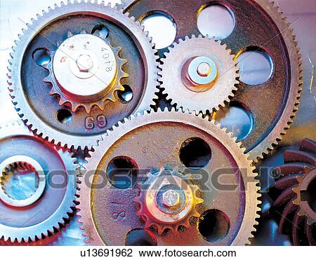 equipment, indoor, cog wheel, device, workmanship, metal, toothed View Large Photo Image Stock Image - equipment, indoor, cog wheel, device, workmanship, metal, toothed. Fotosearch