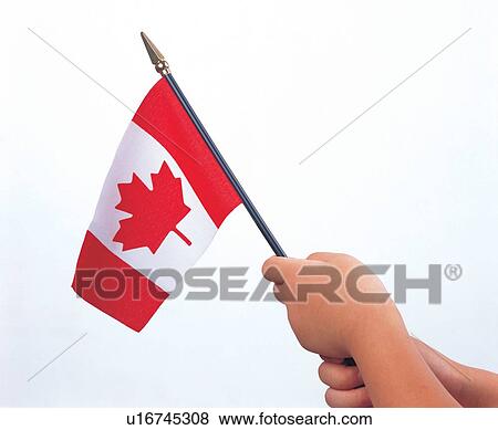 Stock Photo - fine, close-up, human hand, flag, nationality, symbolic. Fotosearch