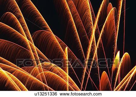 Bronze-colored Fireworks Exploding in the Night Sky, Long Exposure, Low Angle View View Large Photo Image Stock Photograph - Bronze-colored Fireworks Exploding in the Night Sky, Long Exposure, Low Angle View. Fotosearch