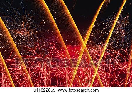 Dark Red and Orange-colored Fireworks Exploding in the Night Sky, Long Exposure, Low Angle View View Large Photo Image Stock Photography - Dark Red and Orange-colored Fireworks Exploding in the Night Sky, Long Exposure, Low Angle View . Fotosearch
