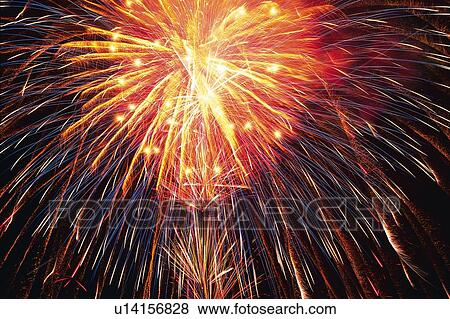 Multicolored Fireworks, Exploding in the Night Sky, Long Exposure, Low Angle View View Large Photo Image Stock Photo - Multicolored Fireworks, Exploding in the Night Sky, Long Exposure, Low Angle View . Fotosearch