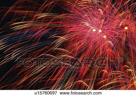 Multicolored Fireworks Exploding in the Night Sky, Long Exposure, Low Angle View View Large Photo Image Stock Photo - Multicolored Fireworks Exploding in the Night Sky, Long Exposure, Low Angle View. Fotosearch