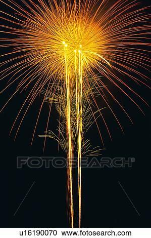 Orange-colored Fireworks Exploding in the Night Sky, Long Exposure, Low Angle View View Large Photo Image Stock Image - Orange-colored Fireworks Exploding in the Night Sky, Long Exposure, Low Angle View . Fotosearch