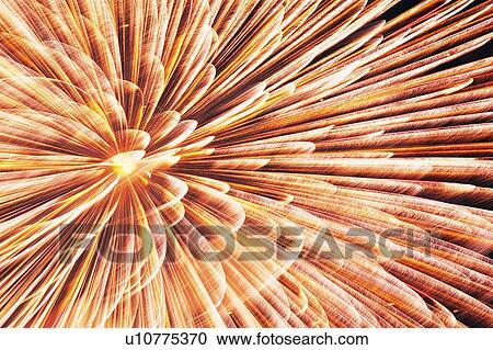 Stock Image -  Pink and Orange-colored Fireworks Exploding in the Night Sky, Long Exposure, Low Angle View. Fotosearch