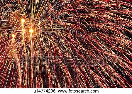 Pink-colored Fireworks Exploding in the Night Sky, Long Exposure, Low Angle View View Large Photo Image Stock Photograph - Pink-colored Fireworks Exploding in the Night Sky, Long Exposure, Low Angle View. Fotosearch