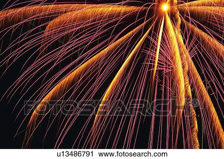 Purple and Orange-colored Fireworks Exploding in the Night Sky, Long Exposure, Low Angle View View Large Photo Image Stock Image - Purple and Orange-colored Fireworks Exploding in the Night Sky, Long Exposure, Low Angle View . Fotosearch