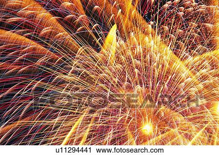 Several Multicolored Fireworks Exploding in the Night Sky, Long Exposure, Low Angle View View Large Photo Image Stock Image - Several Multicolored Fireworks Exploding in the Night Sky, Long Exposure, Low Angle View. Fotosearch
