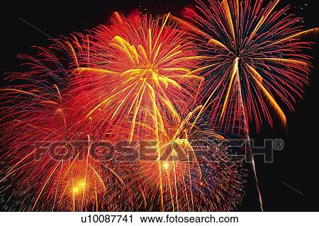 Several Red and Orange-colored Fireworks Exploding in the Night Sky, Long Exposure, Low Angle View View Large Photo Image Stock Image - Several Red and Orange-colored Fireworks Exploding in the Night Sky, Long Exposure, Low Angle View . Fotosearch