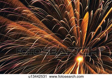 White and Orange-colored Fireworks Exploding in the Night Sky, Long Exposure, Low Angle View View Large Photo Image Stock Image - White and Orange-colored Fireworks Exploding in the Night Sky, Long Exposure, Low Angle View . Fotosearch