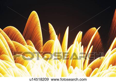 Stock Photo -  Yellow and Bronze-colored Fireworks Exploding in the Night Sky, Long Exposure, Low Angle View . Fotosearch