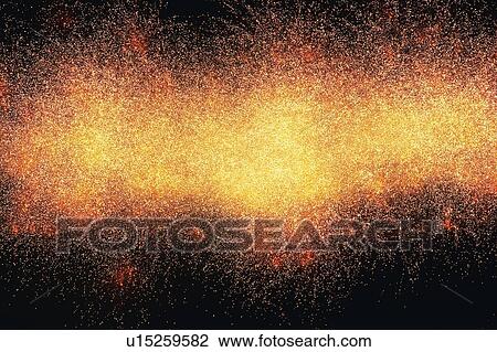 Stock Image -  Yellow and Red-colored Fireworks Exploding in the Night Sky, Long Exposure, Low Angle View . Fotosearch
