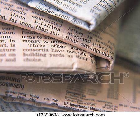 Stock Photo - A bunch of newspapers, Close Up, High Angle View. Fotosearch