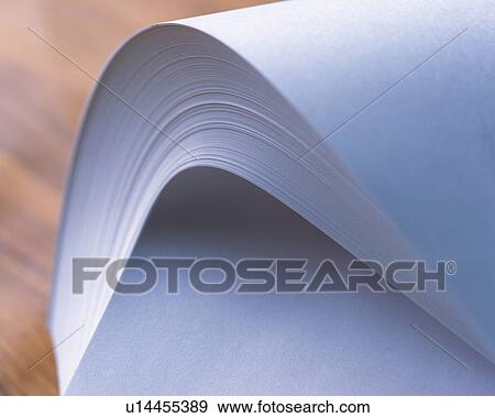 Stock Photo - A bunch of papers, Close Up, High Angle View, Differential Focus. Fotosearch
