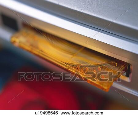 A mini disc and player, Close Up, High Angle View, Differential Focus View Large Photo Image Stock Photograph - A mini disc and player, Close Up, High Angle View, Differential Focus. Fotosearch