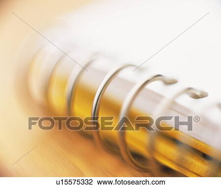 Stock Image - A notebook, Close Up, High Angle View, Soft Focus. Fotosearch