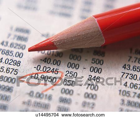 Picture - A red pencil and stock price sheet, Close Up, High Angle View, Differential Focus. Fotosearch