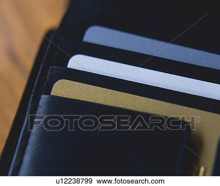 Cards in a wallet, Close Up, High Angle View View Large Photo Image Stock Photo - Cards in a wallet, Close Up, High Angle View. Fotosearch