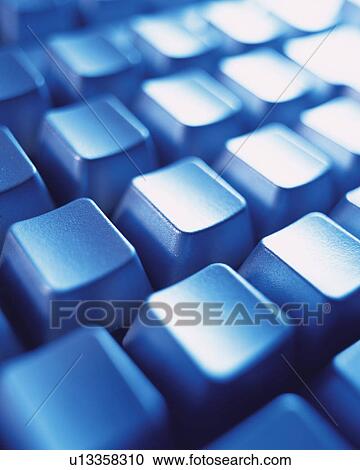 Stock Image - Computer keyboard, Close Up, High Angle View, Differential Focus, Toned Image. Fotosearch