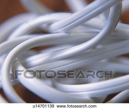 Tangled electrical cords, Close Up, High Angle View, Differential Focus View Large Photo Image Stock Photo - Tangled electrical cords, Close Up, High Angle View, Differential Focus. Fotosearch