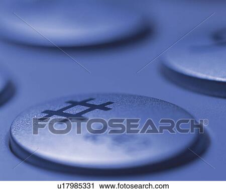 Stock Image - The buttons of a telephone, Close Up, High Angle View, Differential Focus. Fotosearch