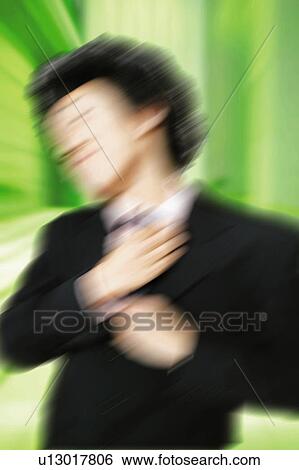 Young Businessman Adjusting Tie View Large Photo Image Stock Photograph - Young Businessman Adjusting Tie. Fotosearch