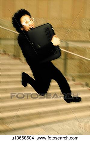 Young Businessman Jumping View Large Photo Image Picture - Young Businessman Jumping. Fotosearch